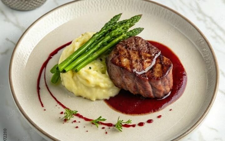 seared steak with mashed potatoes and asparagus